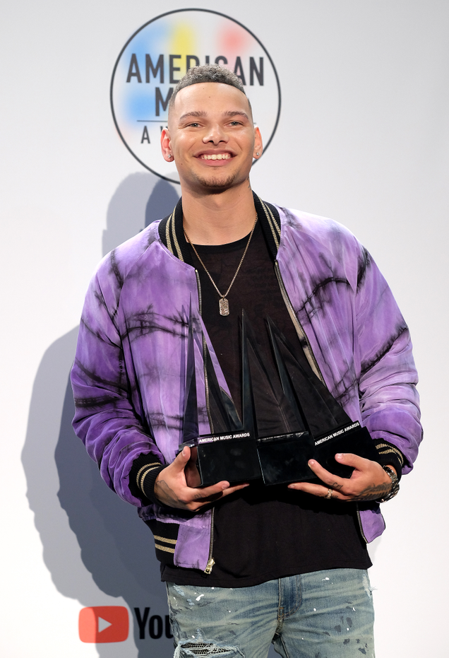 Kane Brown poses in the press room during the 2018 American Music Awards.